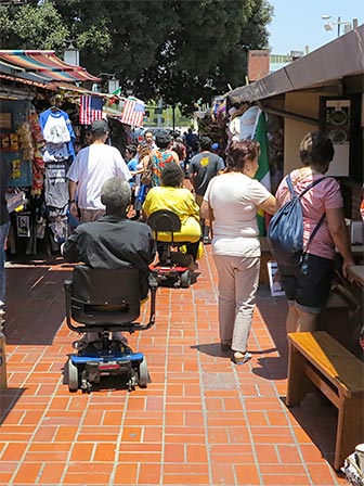 The brick tiled pathway at Olvera Street is easy to traverse. [Photo Credit: LAtourist.com]