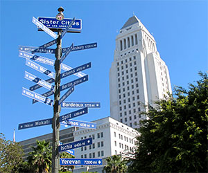 Sister Cities Sign and City Hall in Downtown Los Angeles. [Photo Credit: LAtourist.com]