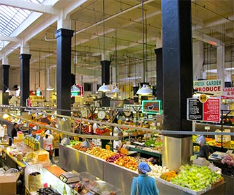 Fruit and vegetable stands at the Grand Central Market in downtown Los Angeles. [Photo Credit: LAtourist.com]