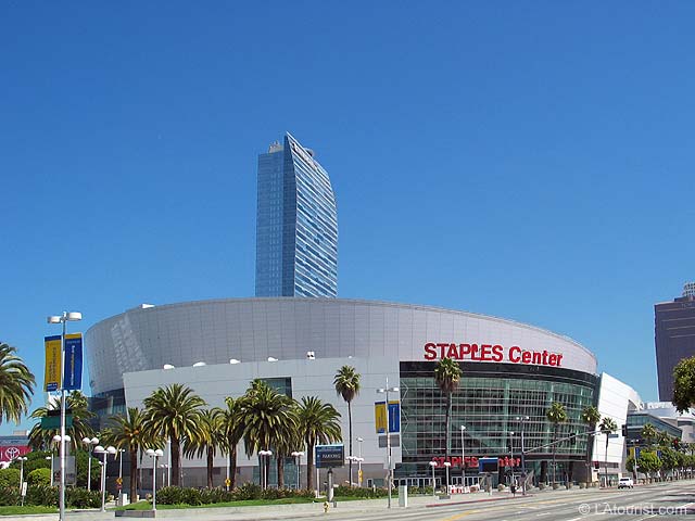 Outside of Staples Center in downtown Los Angeles, with the Ritz Carlton luxury hotel towering overhead