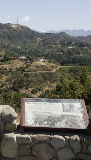 View of the Hollywood Sign from the Hollywood Bowl Overlook on Mulholland Drive in Los Angeles. [Photo Credit: LAtourist.com]