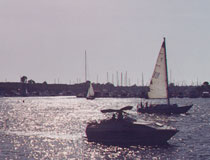 Boats sailing in Redondo Beach Harbor. [Photo Credit: LAtourist.com]