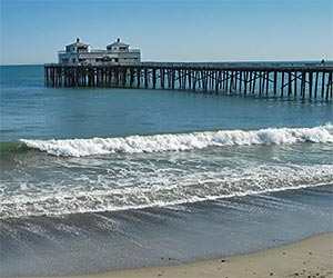 Malibu Pier on the Pacific Ocean, near Los Angeles. [Photo Credit: LAtourist.com]
