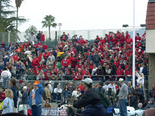 Grandstand seating at the Tournament of Roses Parade in Pasadena. [Photo Credit: LAtourist.com]