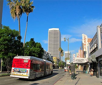 Metro Rapid 720 Bus on Wilshire Boulevard near El Rey Theatre. [Photo Credit: LAtourist.com]