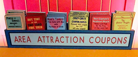 Area Attractions Coupons Display at Simpsons Ride, Universal Studios Hollywood. [Photo Credit: LAtourist.com]